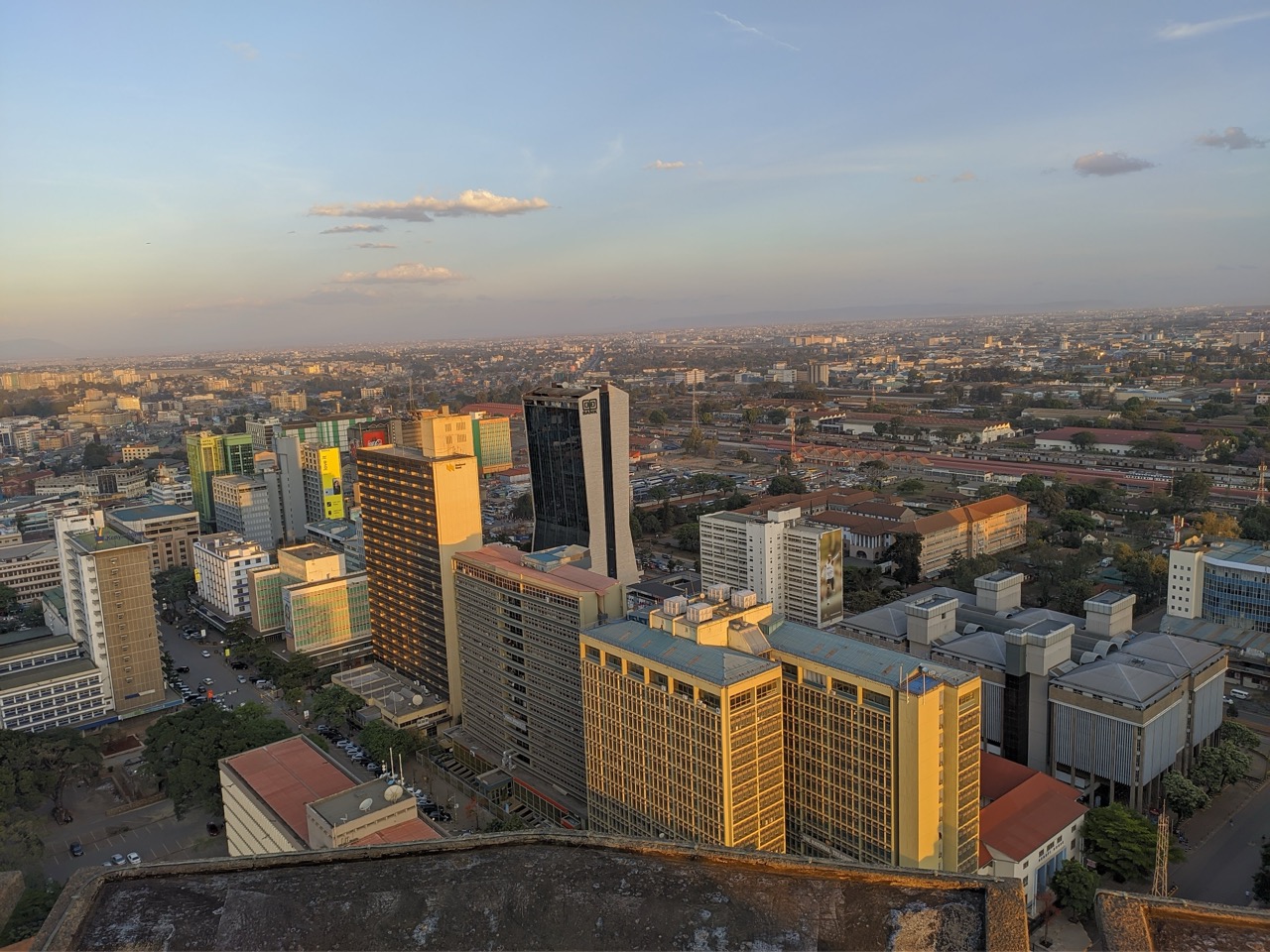 Aerial view of the Nairobi skyline from the KICC rooftop at golden hour