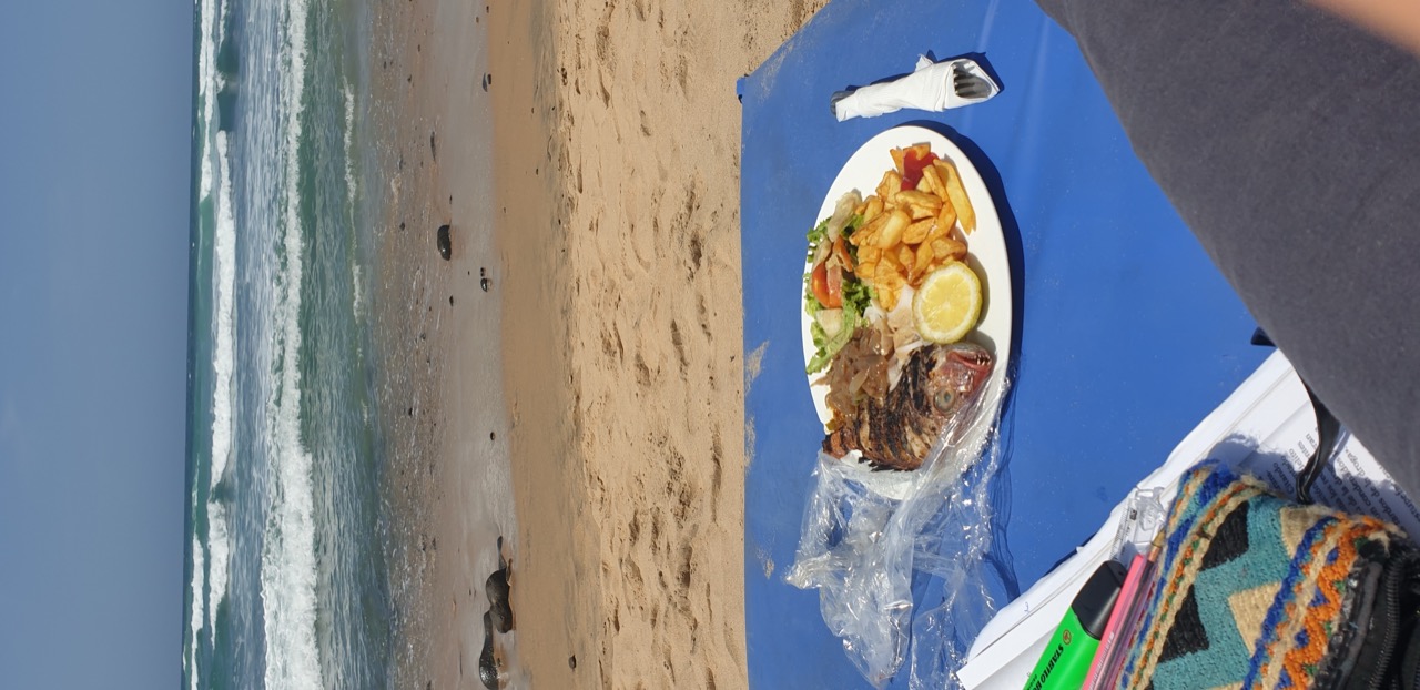Fresh dorada fish in front of the source